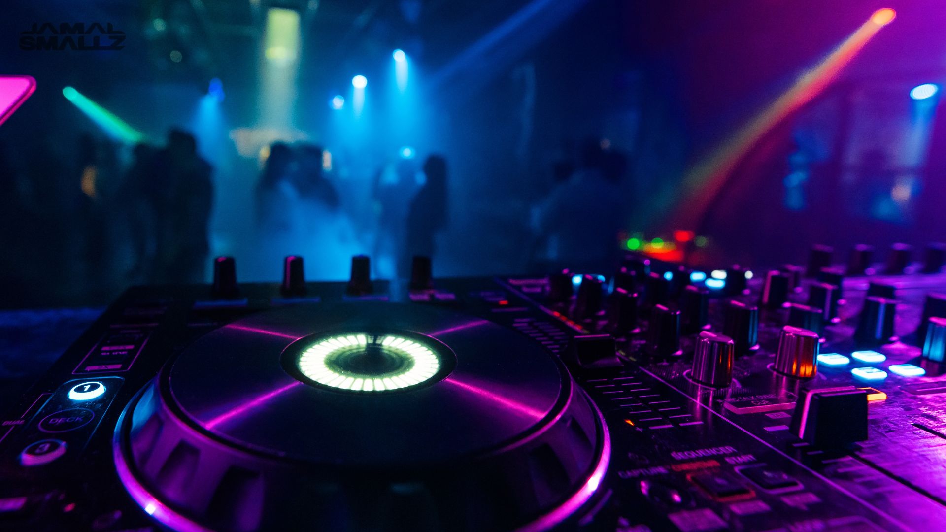 Chicago event DJ controller setup with live dance floor in the background