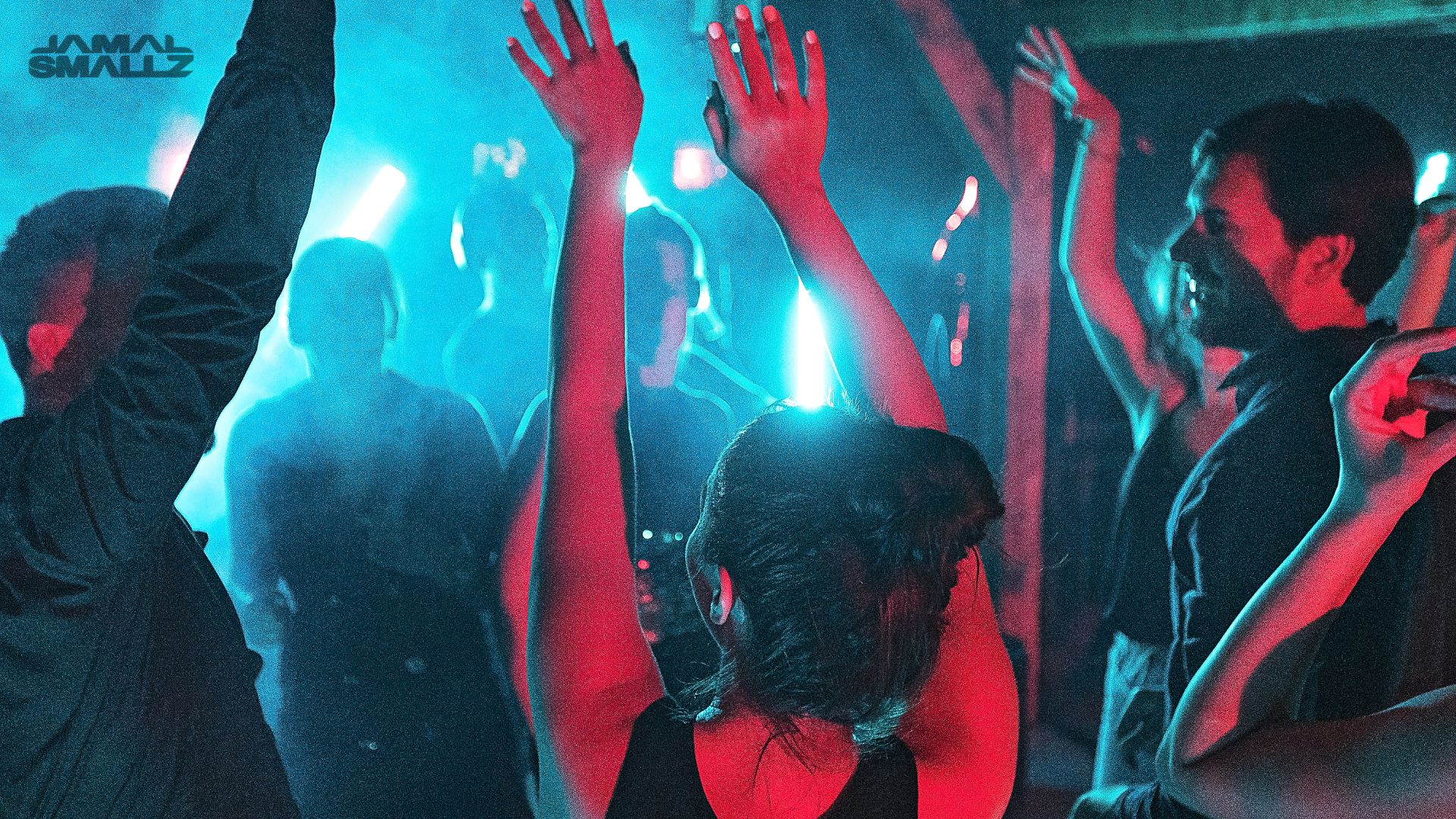 Chicago event DJ performing for a packed dance floor at a large wedding or corporate event party