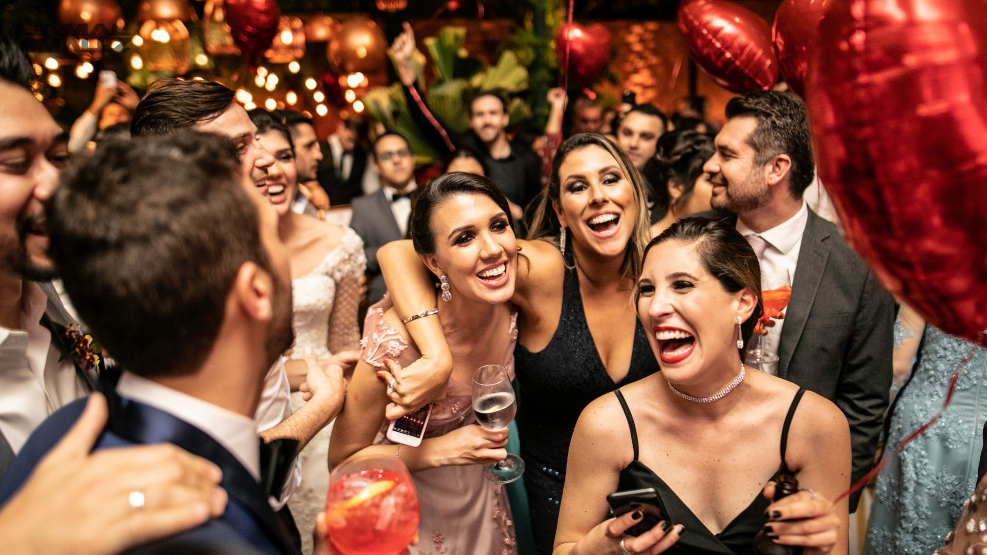 Party guests celebrating and dancing at a Chicago event DJ private party