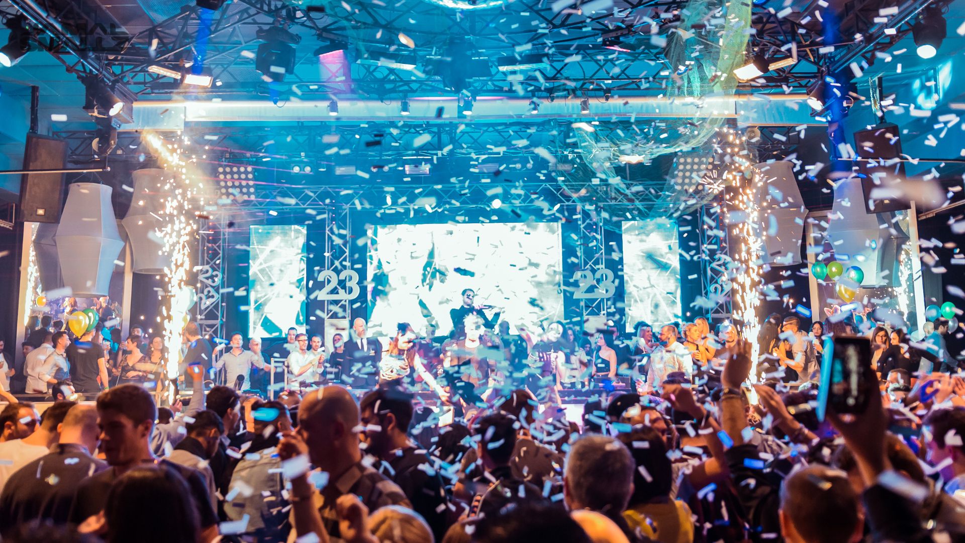 Chicago event DJ stage celebration with colorful confetti explosion at a private party or corporate event