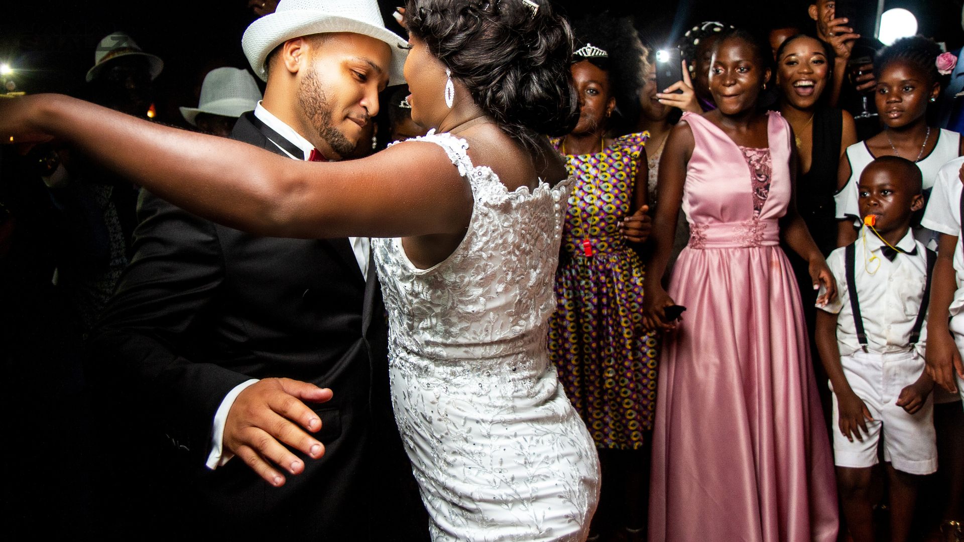 Bride and groom first dance at a Chicago wedding DJ reception in an elegant ballroom