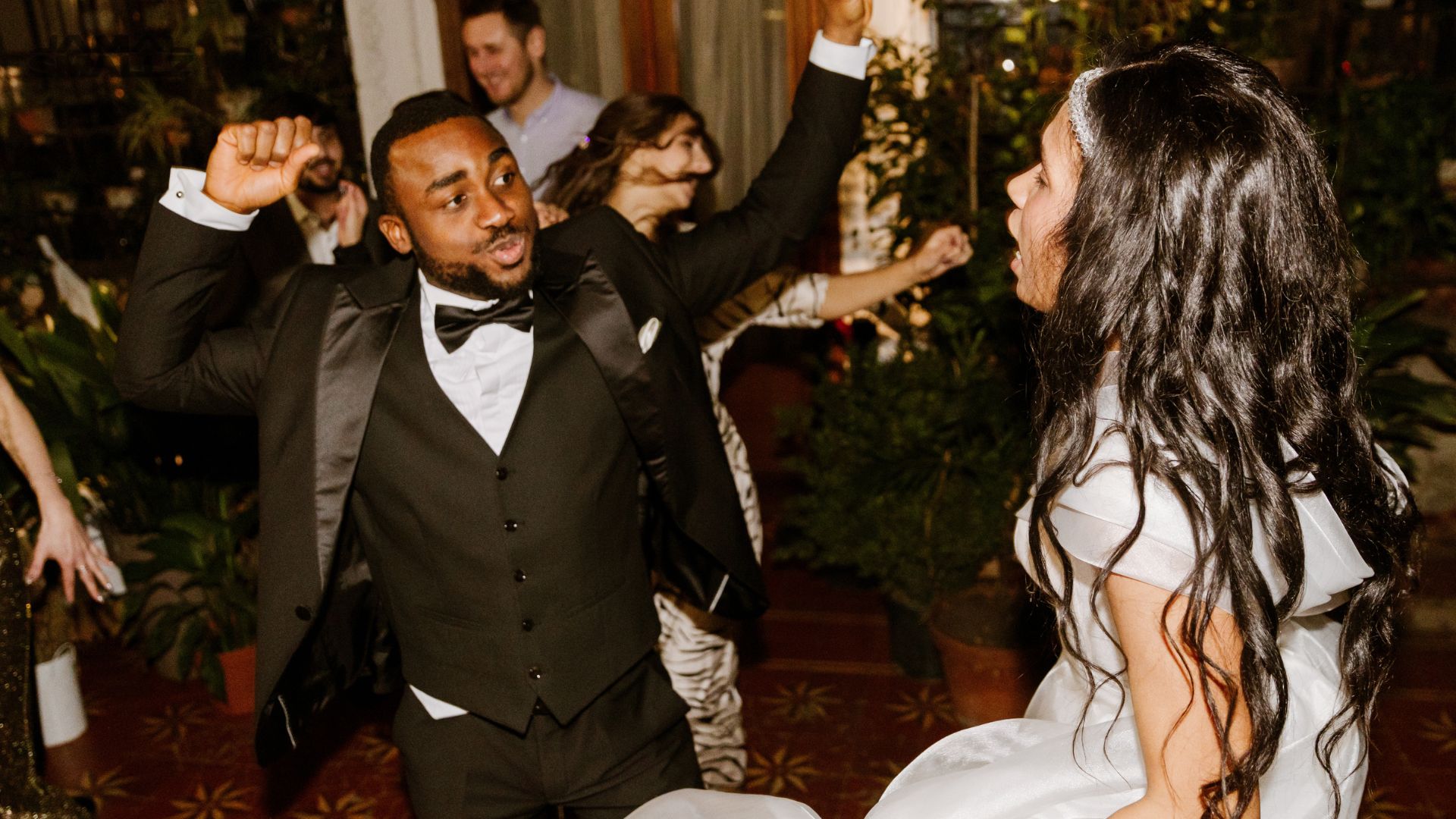 Groom dancing and celebrating at a Chicago wedding DJ reception party