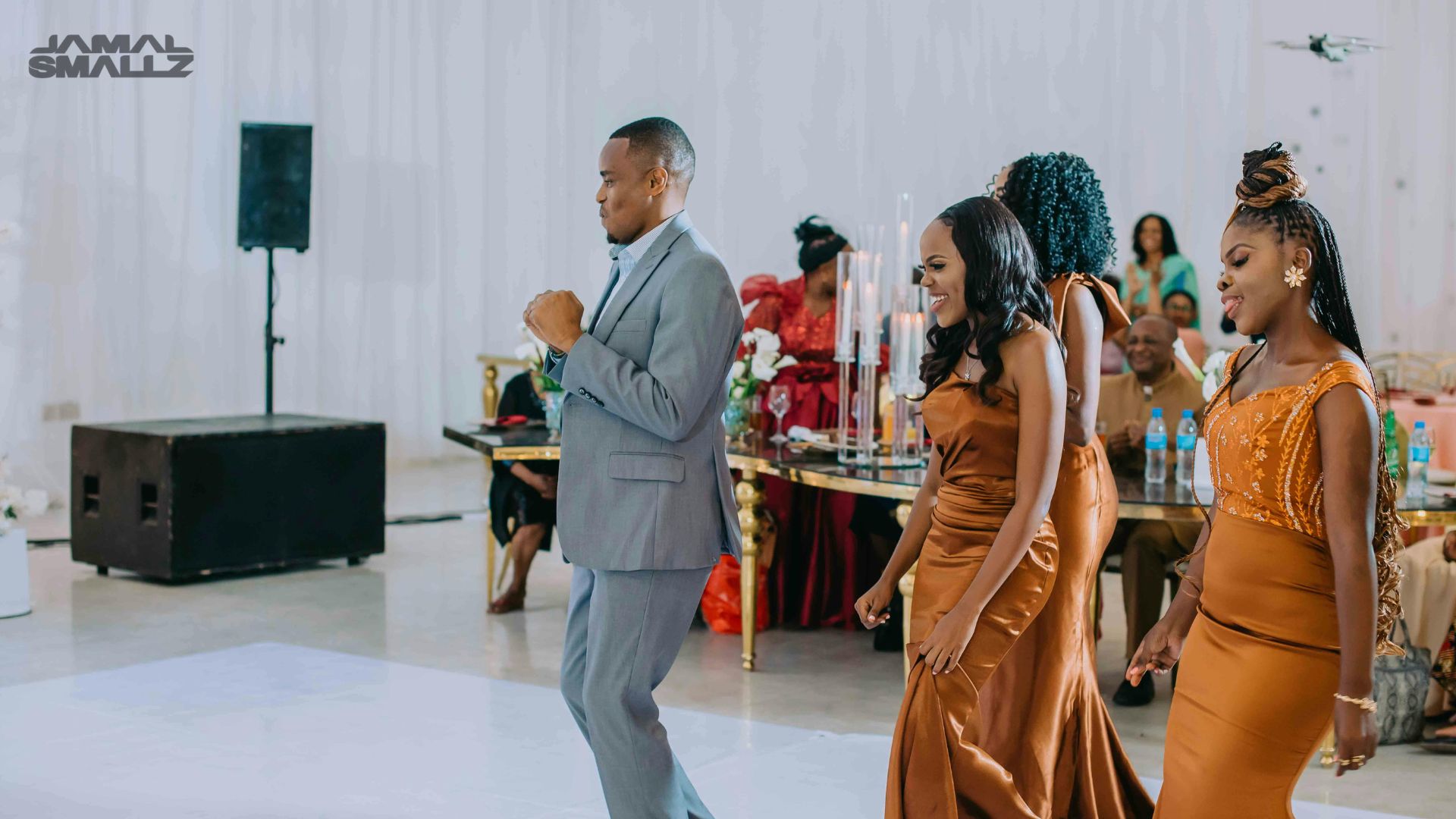 Grand entrance at a Chicago wedding DJ reception with crowd cheering for the couple